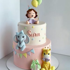 Frozen Cake for Kids with Elsa topper, elephant and giraffe fondant figures